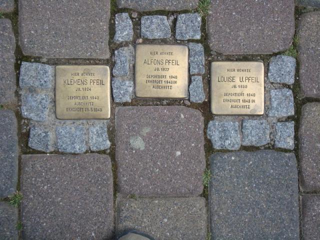 near St Antonious , on the floor some memories for Auschwitz killed ppl
